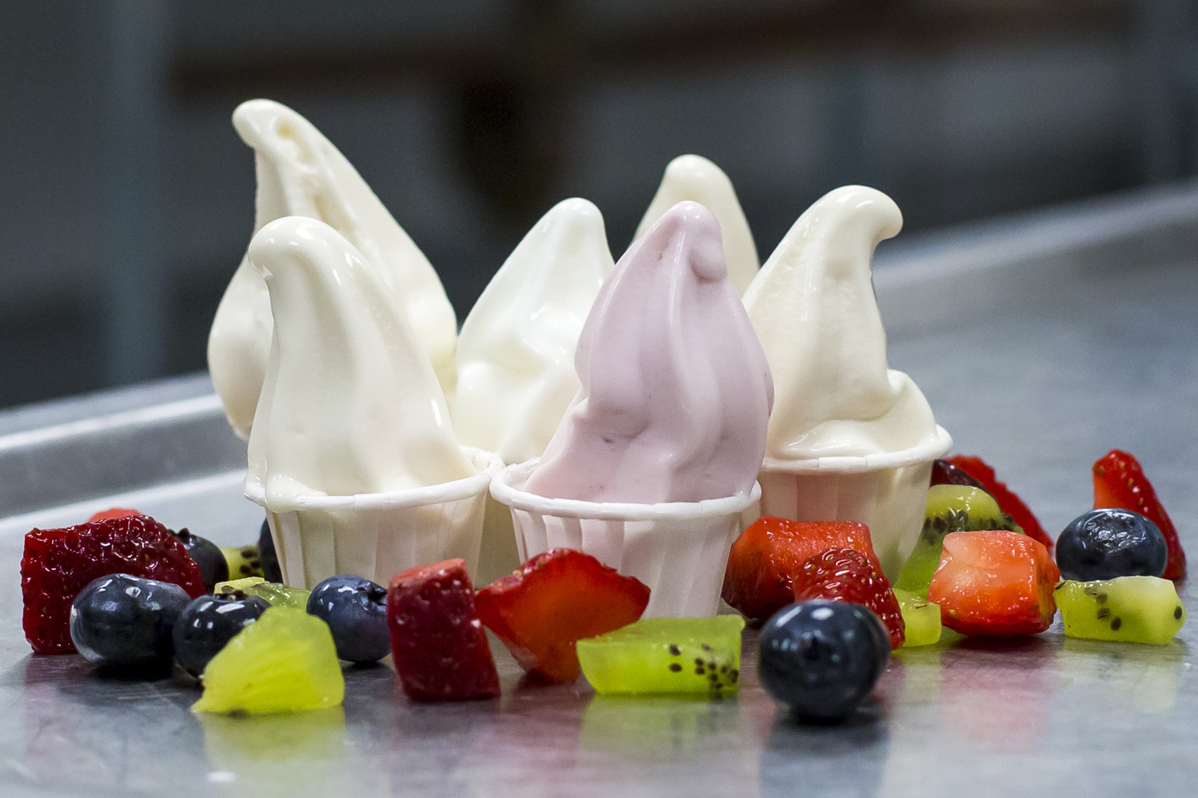 Fresh frozen yogurt cups with fruit at Ayelada