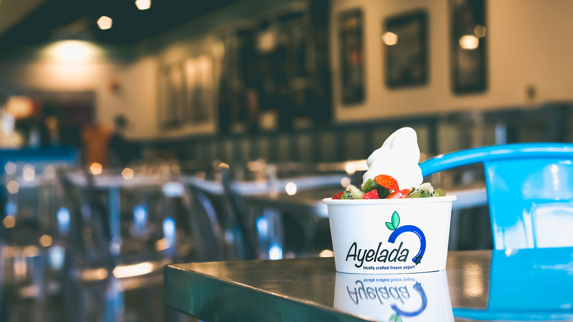Homemade Ayelada frozen yogurt on a table inside the Pittsfield shop